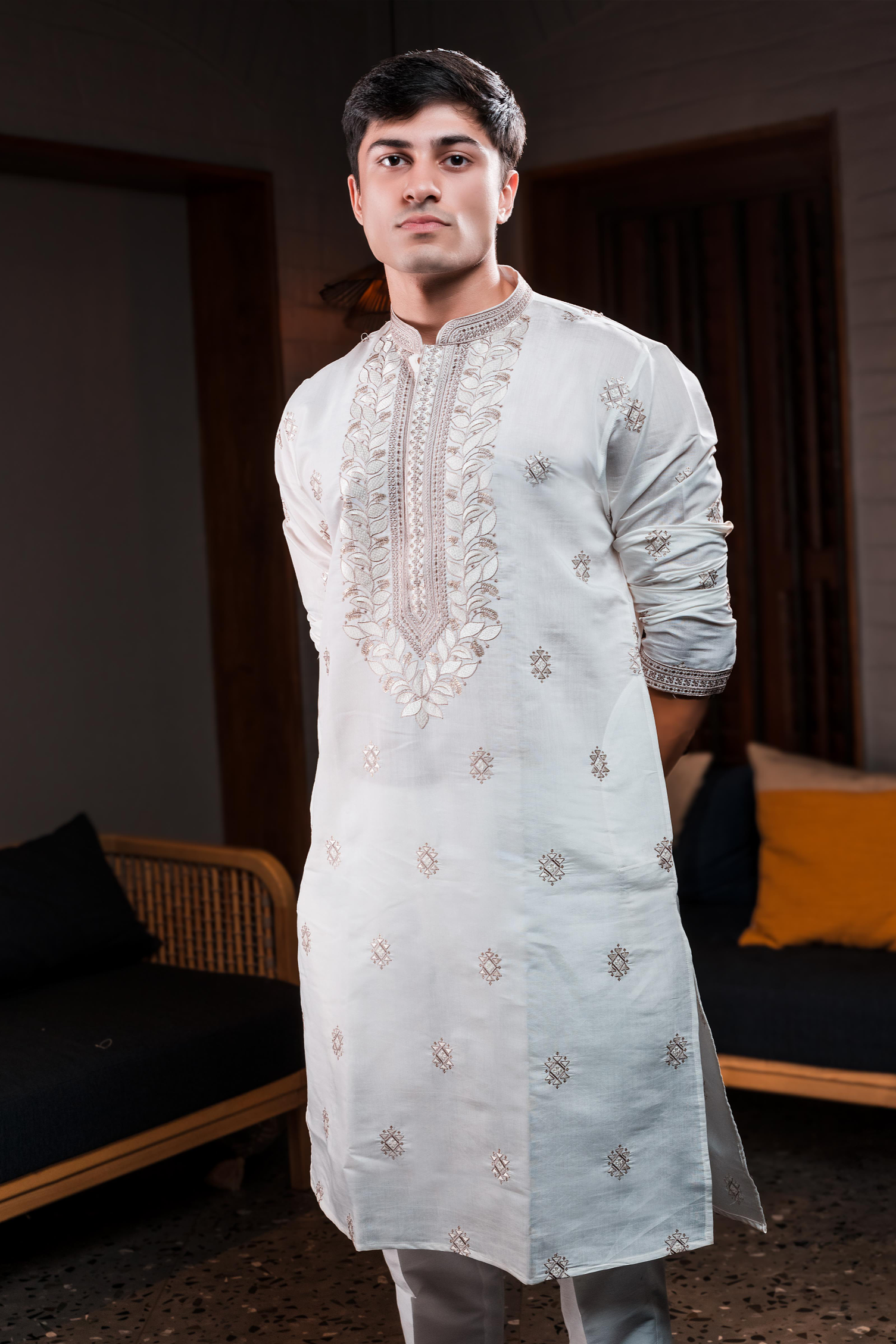 Silk Embroidered off-white kurta.