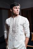 Silk Embroidered off-white kurta.