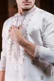 Silk Embroidered off-white kurta.